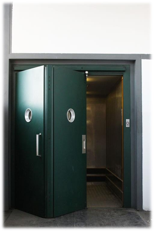 Automatic load folding door